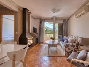 Posezení v ubytování Apartment La Felicidad-2 by Interhome + 10 fotografií