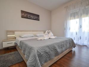 Postel nebo postele na pokoji v ubytování Holiday Home Stipe by Interhome