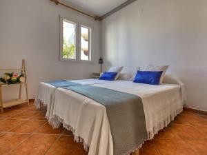 Postel nebo postele na pokoji v ubytování Apartment La Felicidad-2 by Interhome