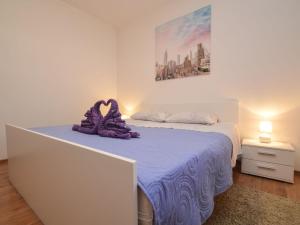 Postel nebo postele na pokoji v ubytování Holiday Home Stipe by Interhome