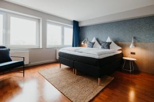 Postel nebo postele na pokoji v ubytování Siel59 Hotel & Restaurant