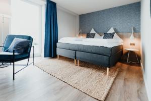 Postel nebo postele na pokoji v ubytování Siel59 Hotel & Restaurant