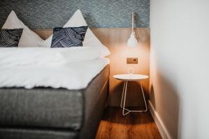 Postel nebo postele na pokoji v ubytování Siel59 Hotel & Restaurant