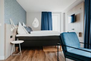 Postel nebo postele na pokoji v ubytování Siel59 Hotel & Restaurant