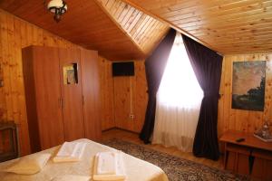 TV a/nebo společenská místnost v ubytování New Aosta Garden