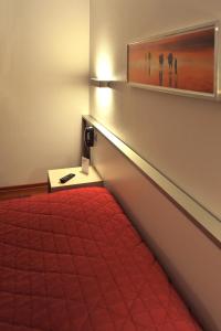 Postel nebo postele na pokoji v ubytování Sud Hotel