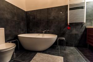 Kúpeľňa v ubytovaní R38 - Artists luxury home + 37 fotografií