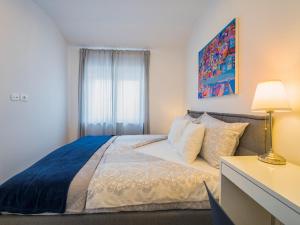 Posteľ alebo postele v izbe v ubytovaní Villa Mondo Adria