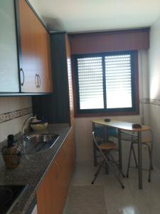 Kuchnia lub aneks kuchenny w obiekcie Espe Daga Apartamento