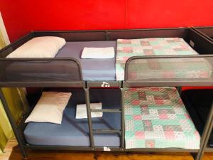 Postel nebo postele na pokoji v ubytování Asian Everest House