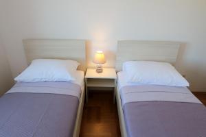 Tempat tidur dalam kamar di Villa Masline