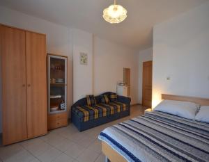 Postel nebo postele na pokoji v ubytování Apartments & Room Matic