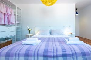 Postel nebo postele na pokoji v ubytování Apartments Simović