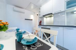 Kuchyň nebo kuchyňský kout v ubytování Apartments Simović
