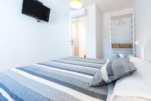 Postel nebo postele na pokoji v ubytování Apartments Simović