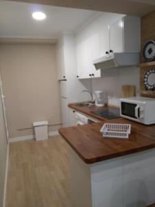 Kuchyňa alebo kuchynka v ubytovaní Torre Center II