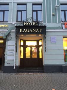 a hotel with a sign over the door of a building at Hotel Kaganat in Kazan