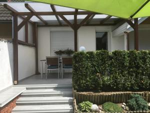Vonkajšia záhrada v ubytovaní Beta Apartman