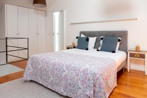 Cama o camas de una habitación en Casas do Teatro
