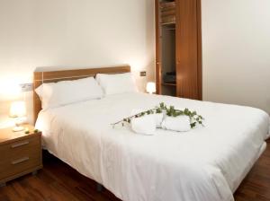 Postel nebo postele na pokoji v ubytování Andorra4days Soldeu - El Tarter