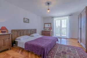 Postel nebo postele na pokoji v ubytování Villa John + 32 fotografií