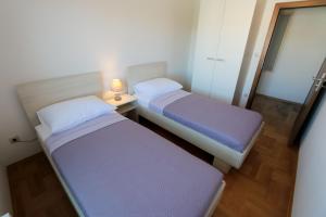 Tempat tidur dalam kamar di Villa Masline