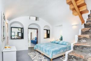 En eller flere senger på et rom på Casa d'Argento