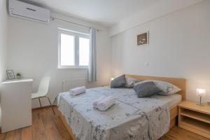 Postel nebo postele na pokoji v ubytování VILLA VIS MARIS + 34 fotografií