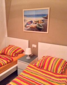 Postel nebo postele na pokoji v ubytování Hartmut Friedrich Apartment Port de Soller