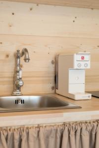 a kitchen counter with a sink and a mixer at Park Residence in Split