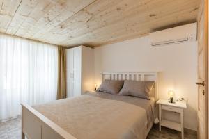 Кровать или кровати в номере Park Residence