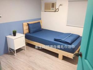 Voodi või voodid majutusasutuse 巷弄內的老宅 toas +1 foto