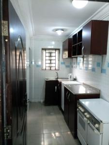 Kuchyň nebo kuchyňský kout v ubytování KH Lodge Abuja