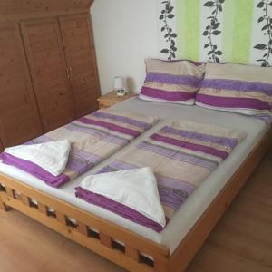 Posteľ alebo postele v izbe v ubytovaní Beta Apartman