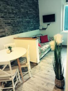TV a/nebo společenská místnost v ubytování Studio apartman Villa Gianna