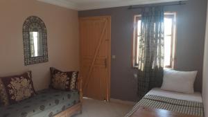 Ruang duduk di Ecolodge Espace Tamount