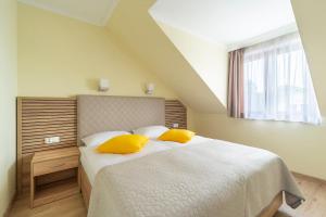 Posteľ alebo postele v izbe v ubytovaní Apartamenty Fregata