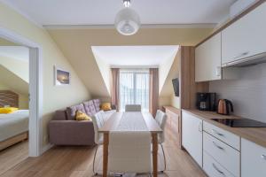 Kuchyňa alebo kuchynka v ubytovaní Apartamenty Fregata