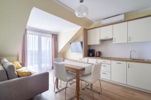 Kuchyňa alebo kuchynka v ubytovaní Apartamenty Fregata