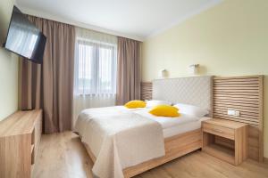 Posteľ alebo postele v izbe v ubytovaní Apartamenty Fregata
