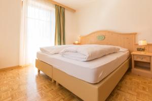Postel nebo postele na pokoji v ubytování Residence Grüne Laterne - Lanterna Verde