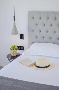 Llit o llits en una habitació de Lofos Village