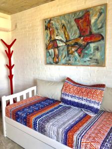 Giường trong phòng chung tại Las Olas Aparts
