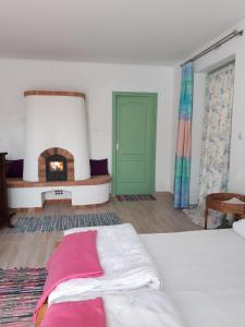Ein Bett oder Betten in einem Zimmer der Unterkunft Duna-Lak Vendégház