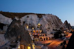 a view of the amalfi coast at night at Miras Hotel in Göreme