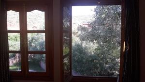 Taman di luar Ecolodge Espace Tamount