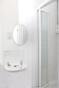 A bathroom at ATZ&H INN 