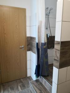 Koupelna v ubytování Green Garden Plus Apartman