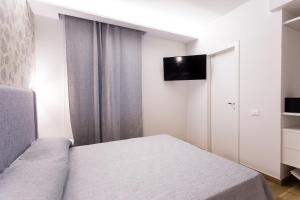 TV a/nebo společenská místnost v ubytování B&B Maria Rosaria
