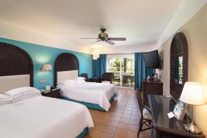 En eller flere senge i et værelse på Barceló Bávaro Beach - Adults Only All Inclusive